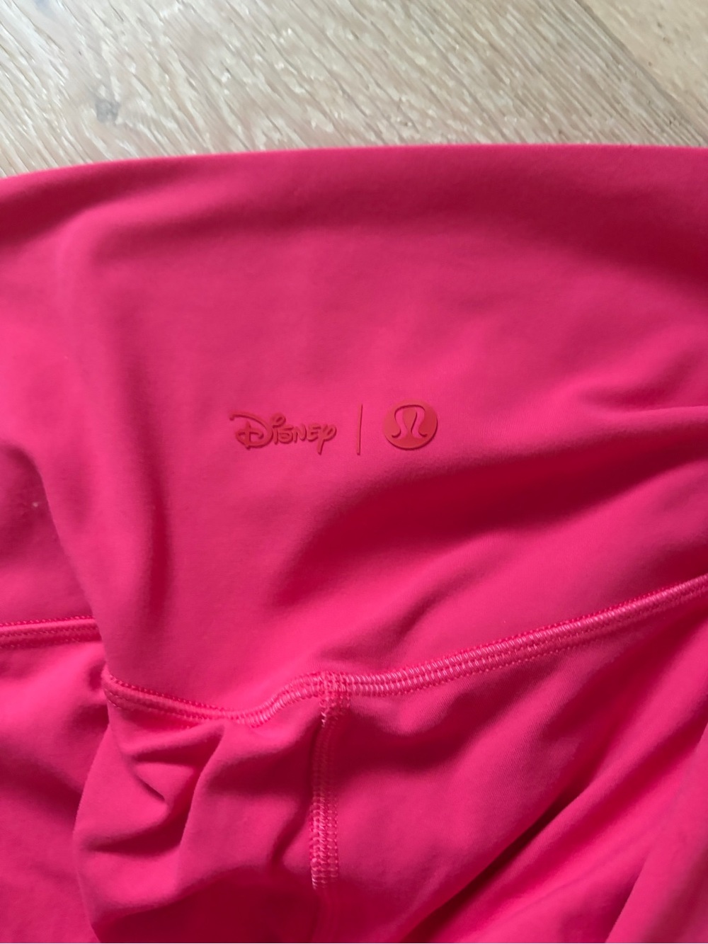lululemon athletica Bright Hot Pink Leggings with Disney Logo